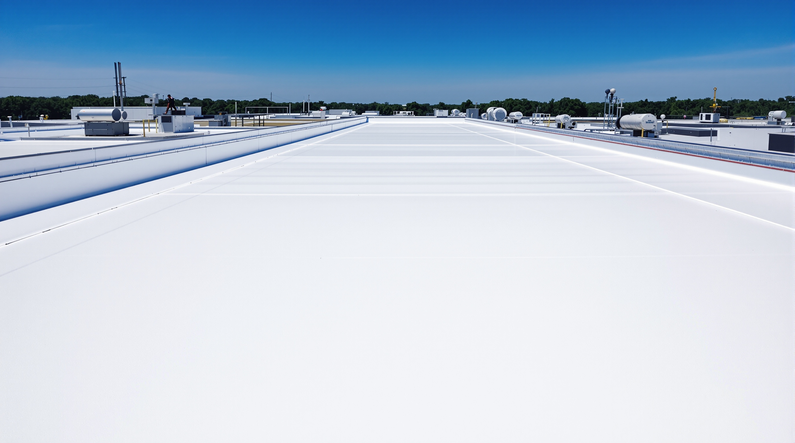 TPO single-ply membrane being heat-welded on a commercial flat roof in South Alabama — energy-efficient and UV-reflective for Gulf Coast heat